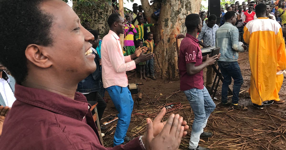 Tefera at a Bible dedication