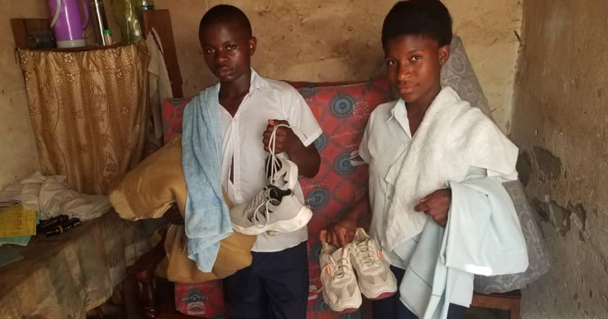 Students with their clothing and bedding Students with their clothing and bedding