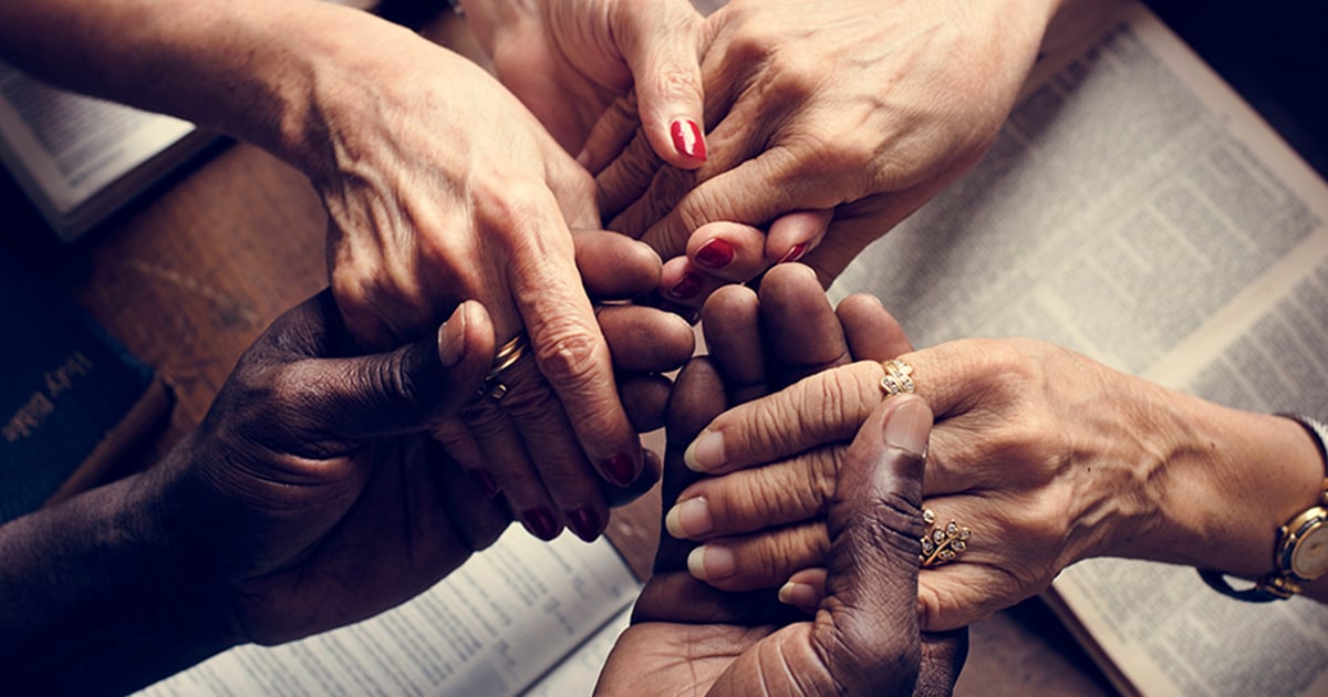 People Praying with Bibles