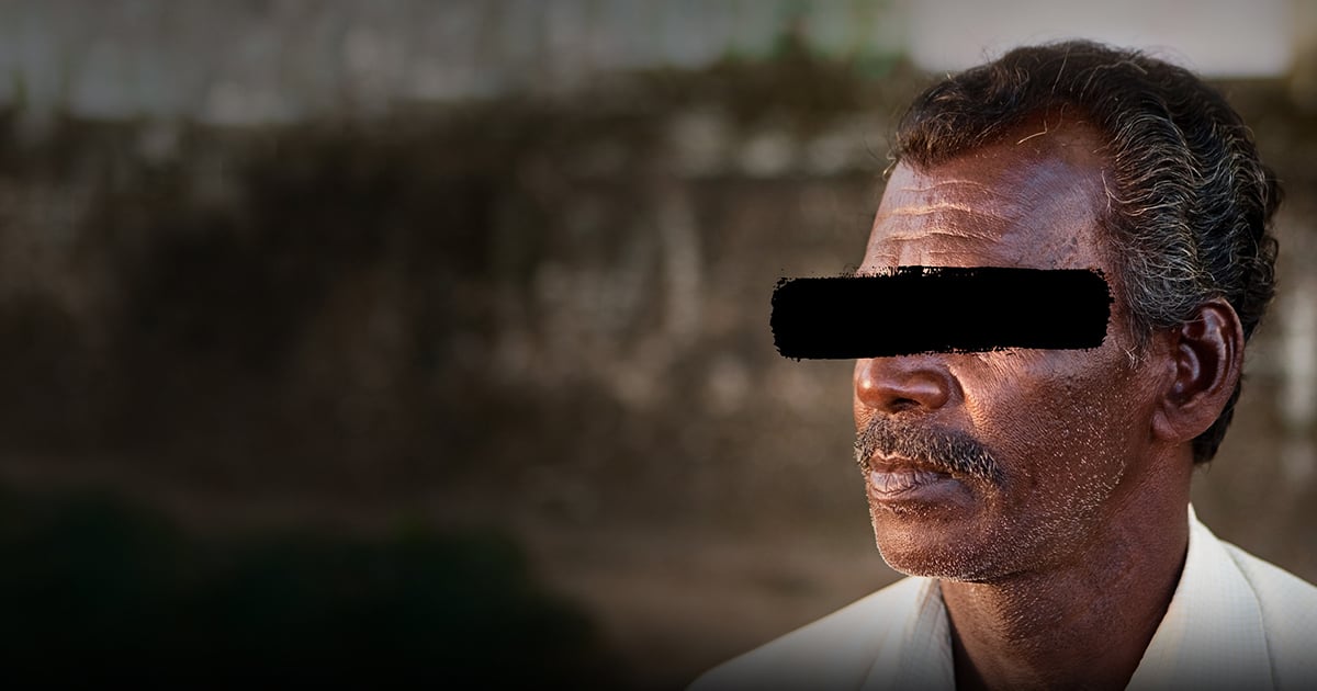 Man_with_black_mark_across _face | Wycliffe Associates Pray for Persecuted Believers