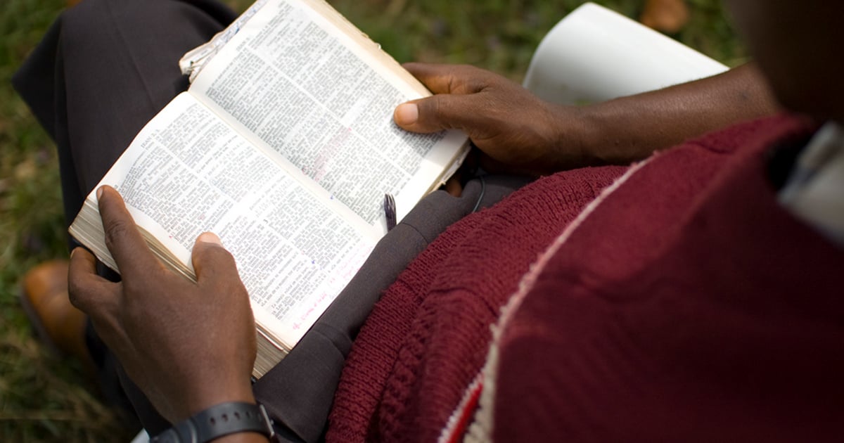 Man reading Bible Man reading Bible
