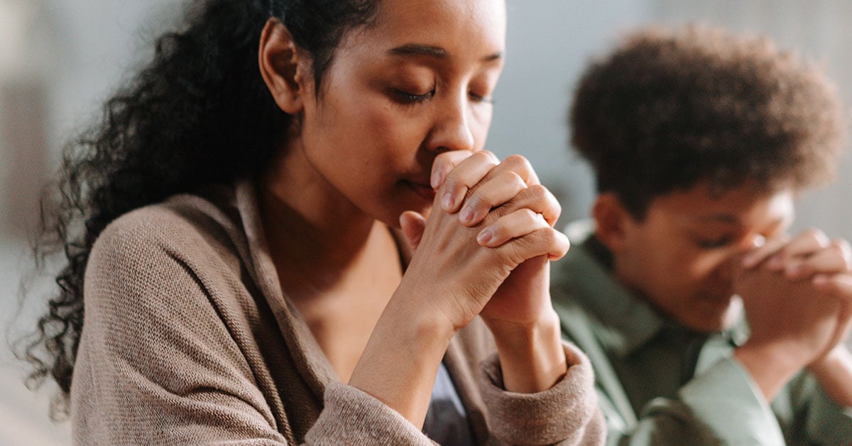 two praying | Wycliffe Associates | Bible Translation